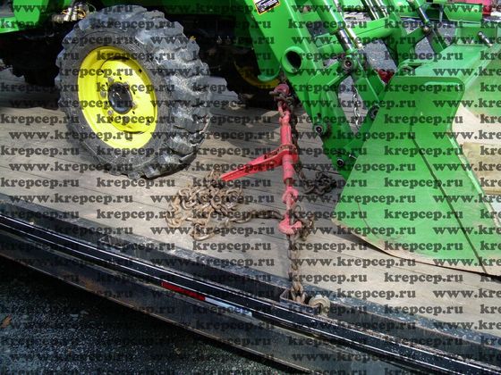 Цепной талреп-натяжитель при стяжке цепями трактора
